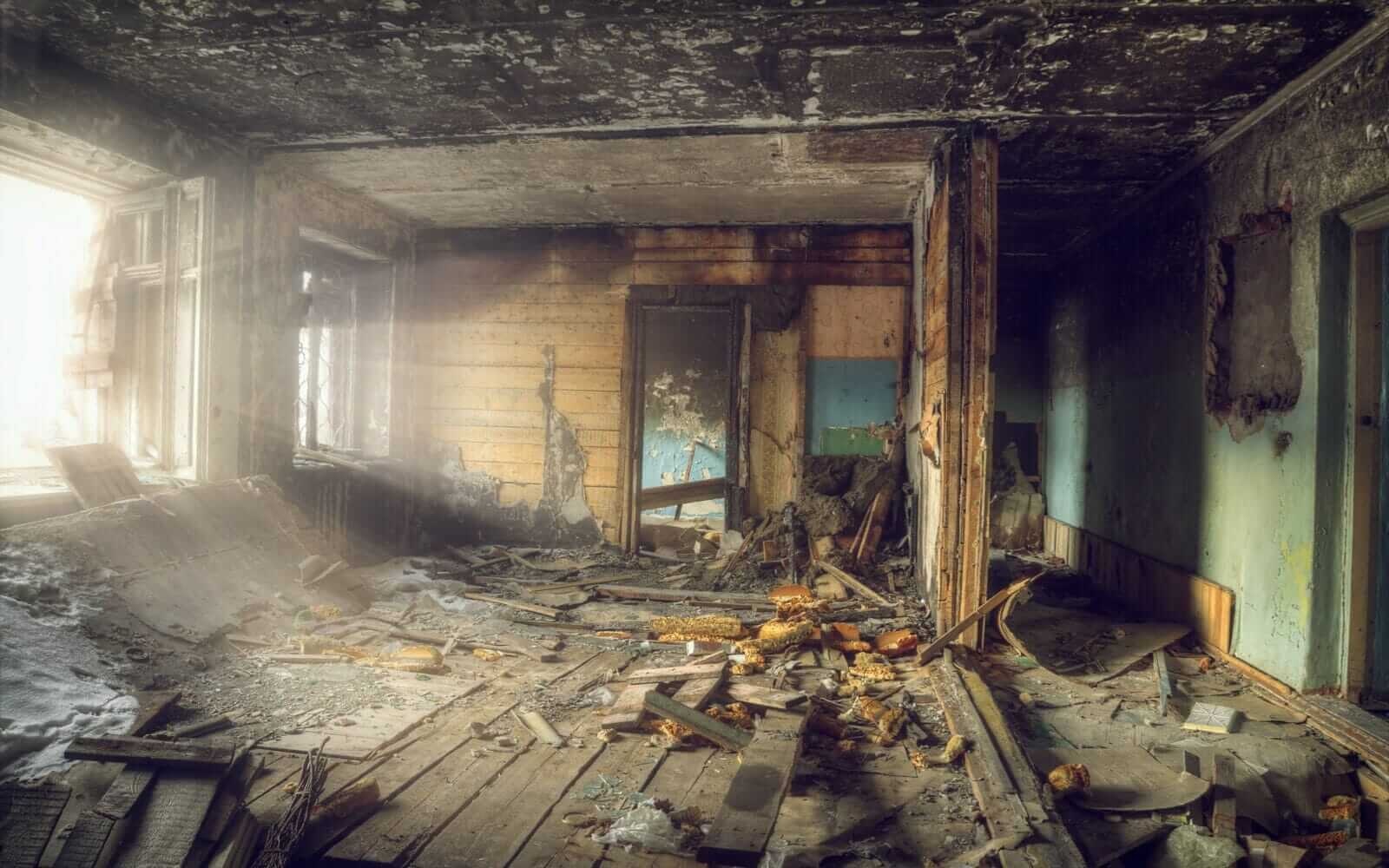 Fire damage restoration service cleaning severe smoke and fire damage in Utah property